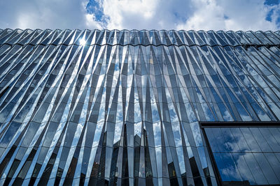 Low angle view of modern building against sky