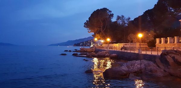 Panoramic view of sea against sky at dusk