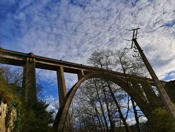 Low angle view of bridge against sky