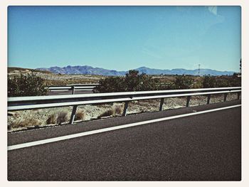 View of road against blue sky