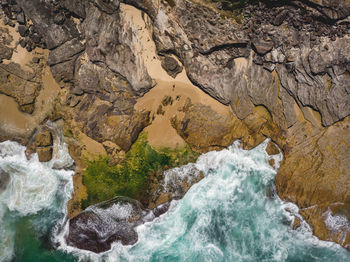 Scenic view of rocks in sea