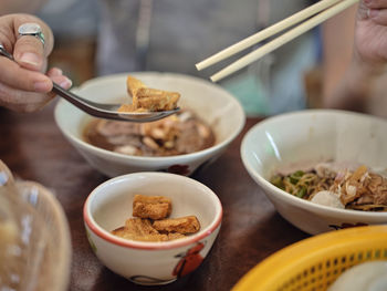 Thai boat noodles in thicken soup added blood with pork balls, 