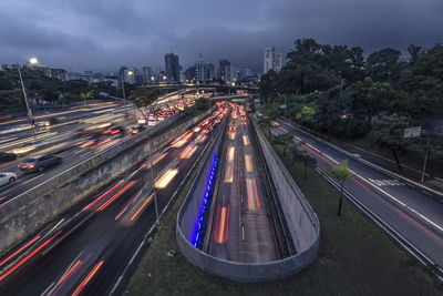 High angle view of light trails on road at night