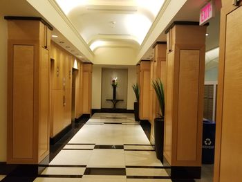 Illuminated corridor of building