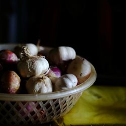 Close-up of eggs in basket on table