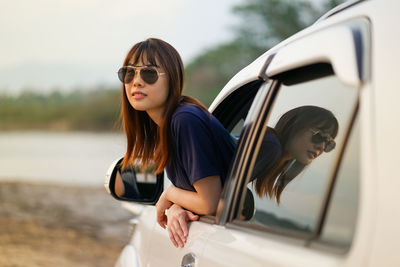 Young woman wearing sunglasses