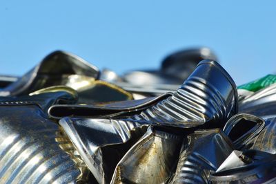 Compacted tin against blue sky