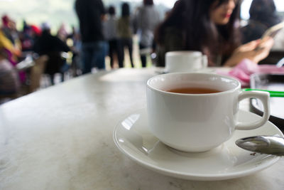 Close-up of coffee served on table
