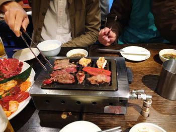 High angle view of people preparing food in restaurant