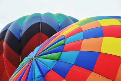 Close-up of two hot air balloons