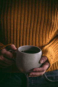 Midsection of coffee cup