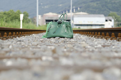 Surface level of purse on railroad track