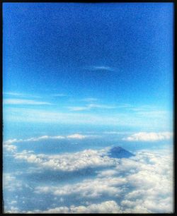 Scenic view of landscape against blue sky