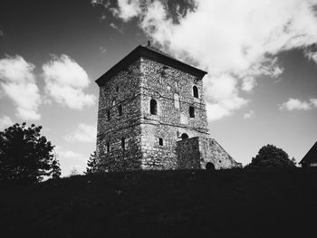 Low angle view of old building against sky