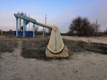 View of playground against clear sky