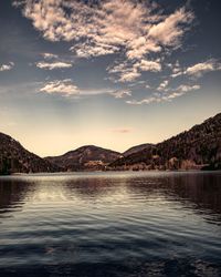 Scenic view of lake against sky during sunset