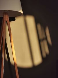 Close-up of electric lamp on table