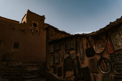 Low angle view of old building against clear sky