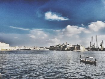 Boats moored at harbor