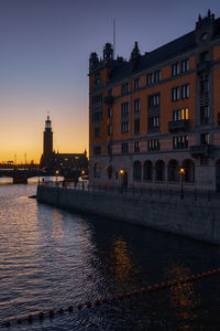 Illuminated buildings at waterfront