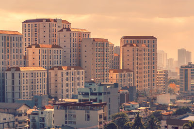 High angle view of buildings in city against sky