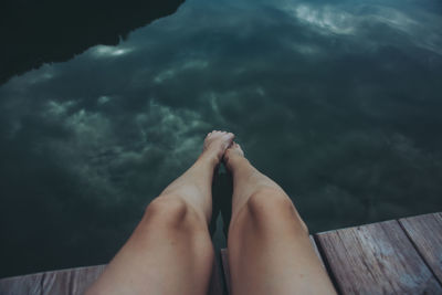 Personal perspective of human feet in water