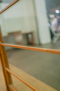 High angle view of railing by window