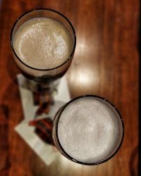 High angle view of beer in glass on table