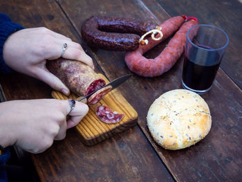 High angle view of person preparing food on table