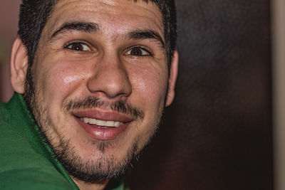 Close-up portrait of a smiling man