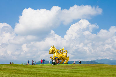 Large golden lion statue at singha park, thailand