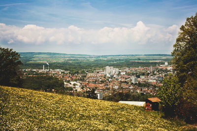 Aerial view of townscape against sky