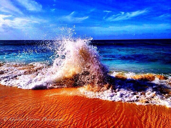 WAVES SPLASHING ON SHORE