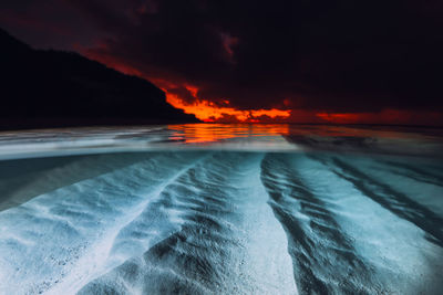 Scenic view of sea against sky during sunset