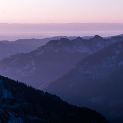 Scenic view of mountains against sky during sunset
