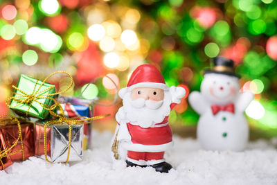 Close-up of christmas decorations on snow