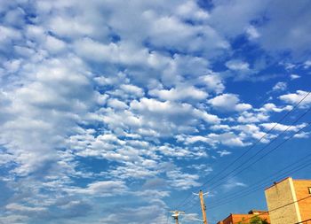 Low angle view of blue sky and clouds