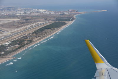 Aerial view of sea and airplane