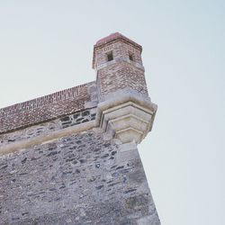 Low angle view of built structure against clear sky