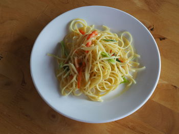 High angle view of noodles in plate on table