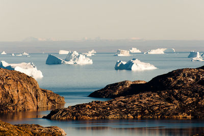 Scenic view of sea against sky during winter