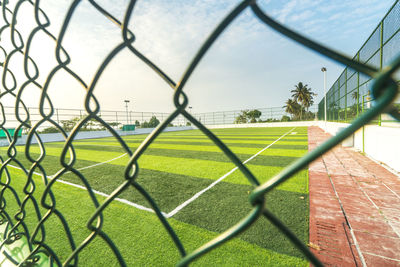 Full frame shot of chainlink fence at playing field