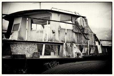 Abandoned house against sky