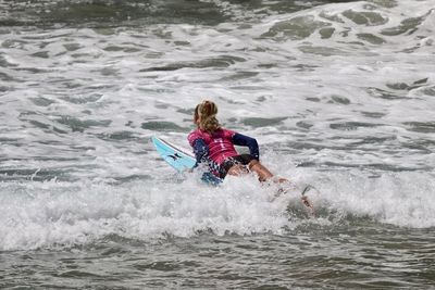 Man surfing in sea