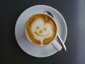 High angle view of coffee cup on table