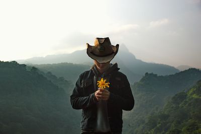 Man photographing through camera