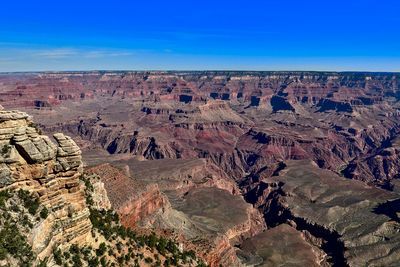 Aerial view of rock formations against sky