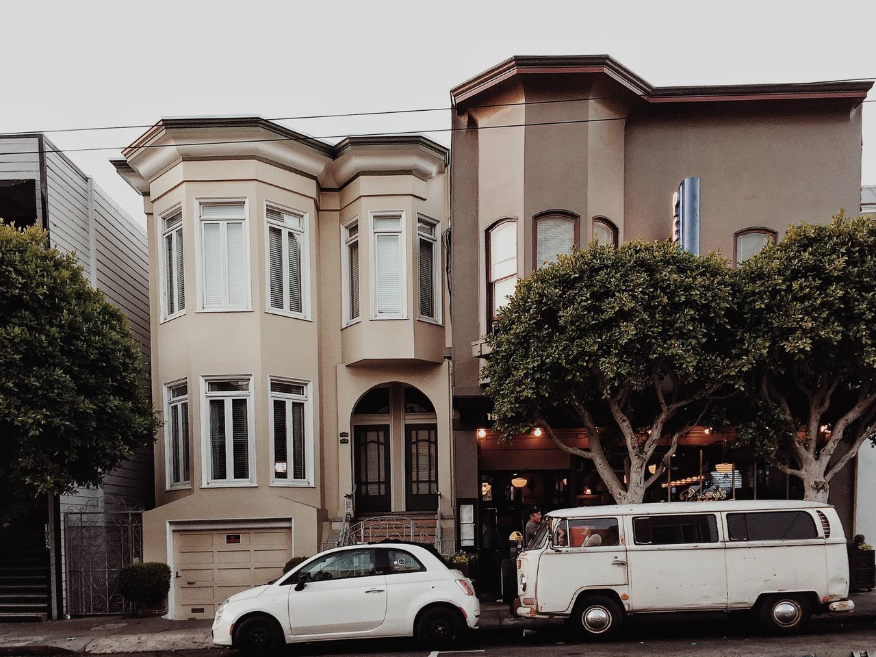 CARS ON STREET IN CITY