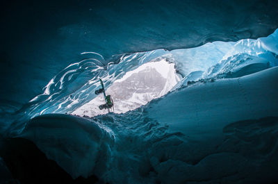 Panoramic view of frozen sea against mountain