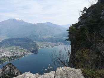 Scenic view of lake and mountains against sky